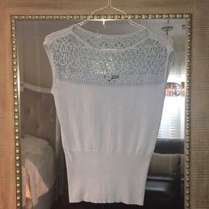 Chelsea & Theodore blue sleeveless sweater blouse